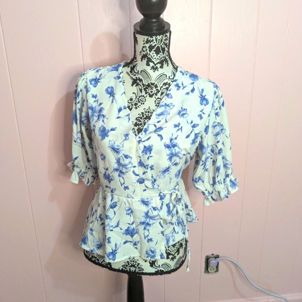 blue and white floral print shirt